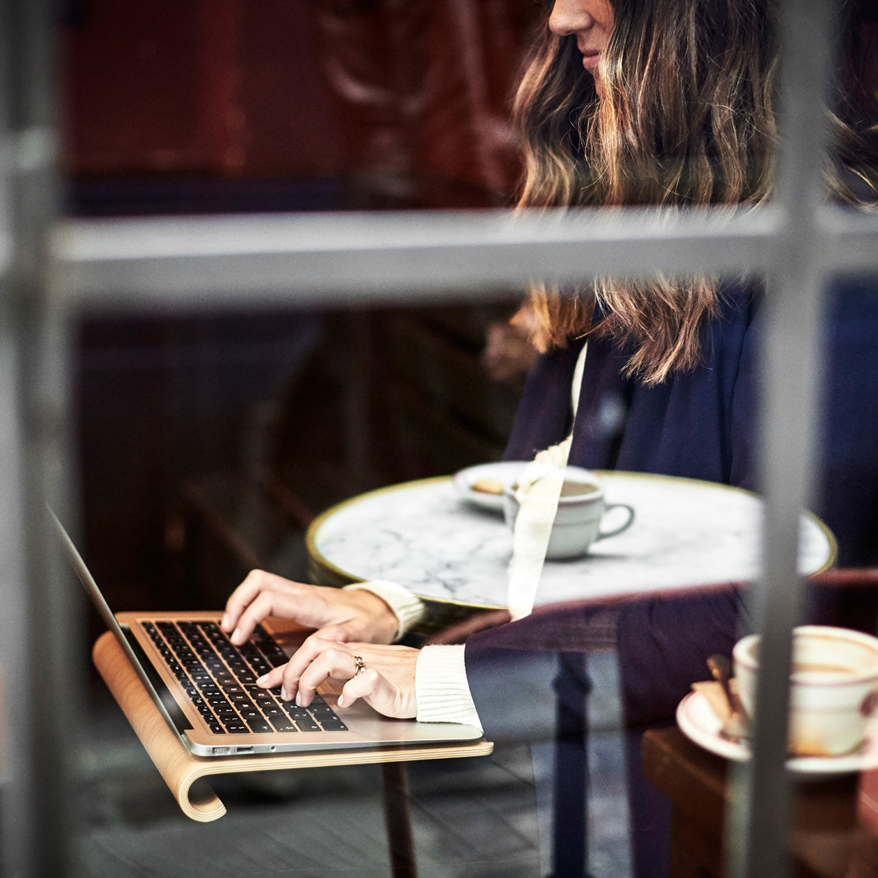 Working on MacBook Stand in wood